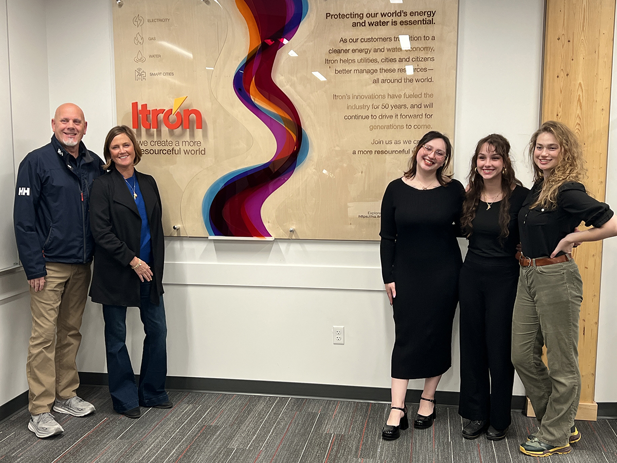 The EWU students along with their Itron mentors celebrated the unveiling of the sign. Pictured from left to right are Robert Fitzner, Callie Bendickson from Itron and EWU students Sierra Crisp-Johnson, Alyssa Almond and Ursella Bakken.