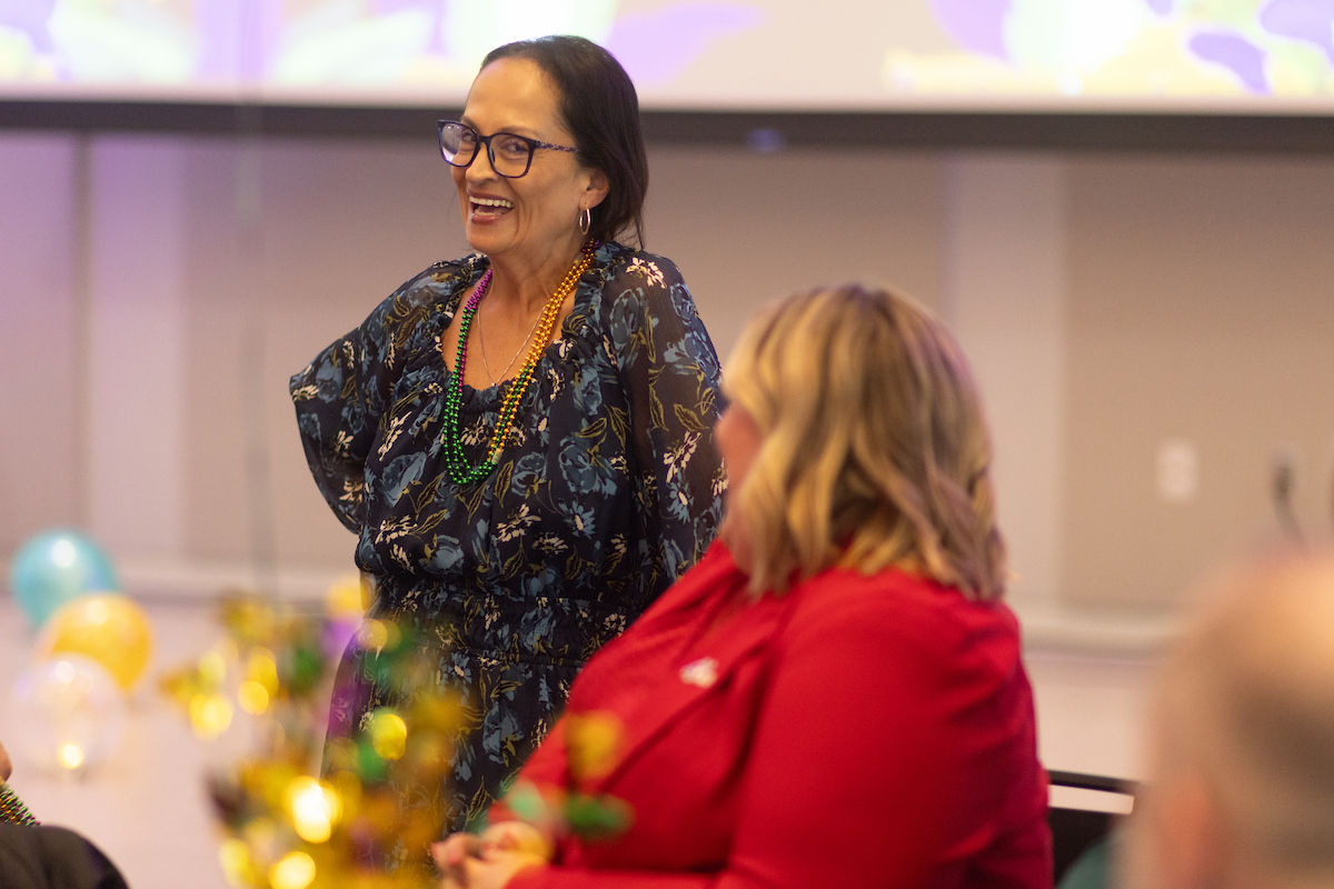 Two employees laughing.