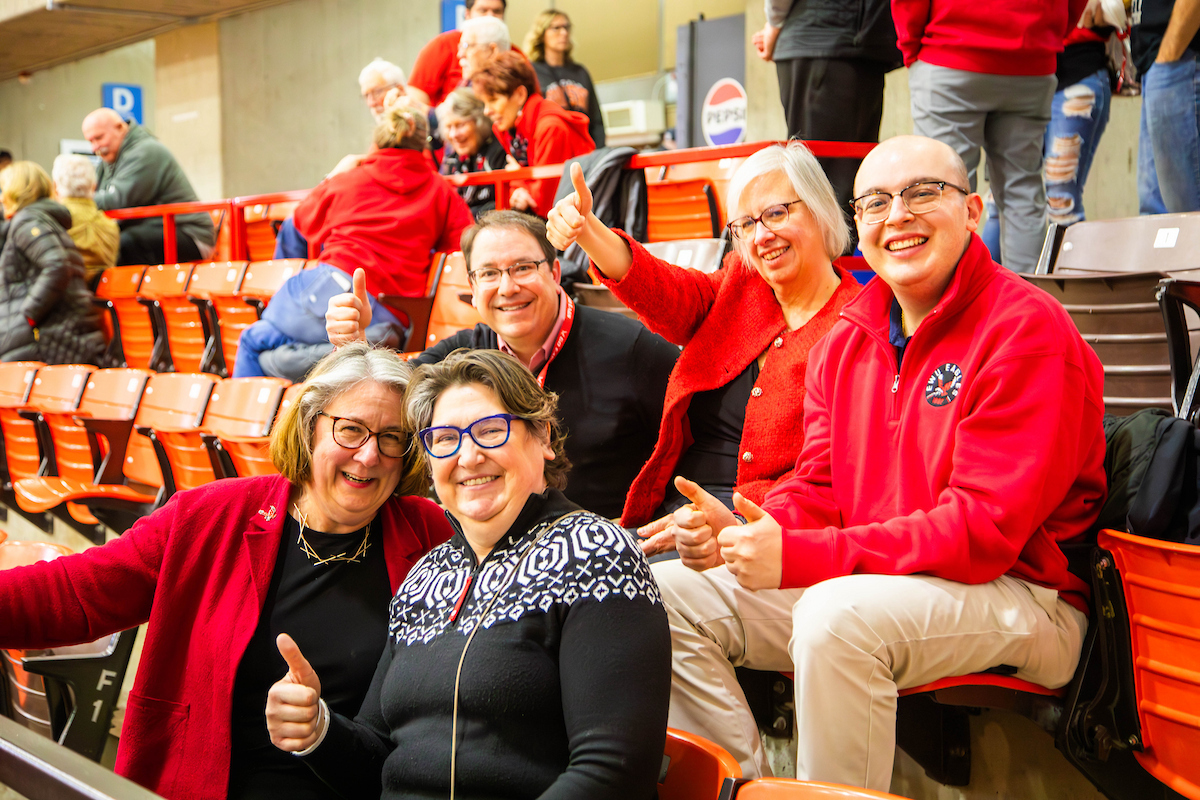 EWU CAHSS Dean and several other employees at the basketball game.