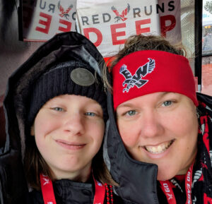 Tessa and Zoë at the Alumni tent at a football game this year.