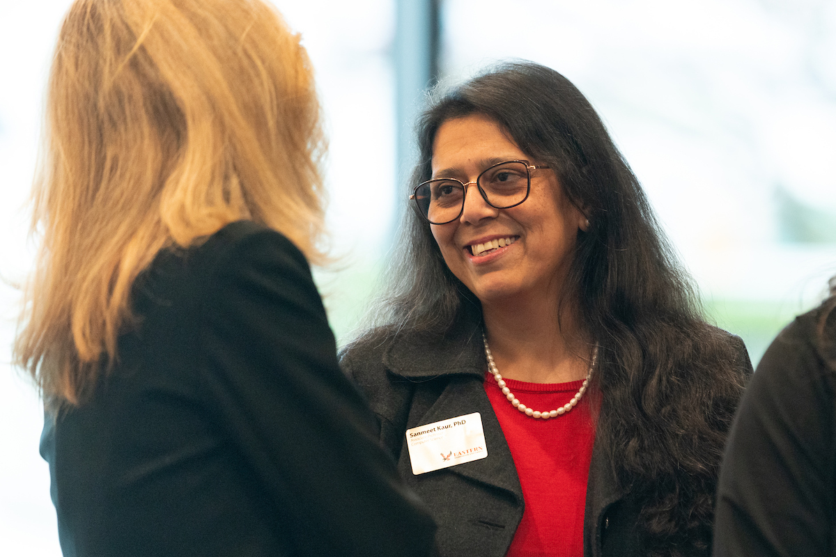 Person smiling and visiting.