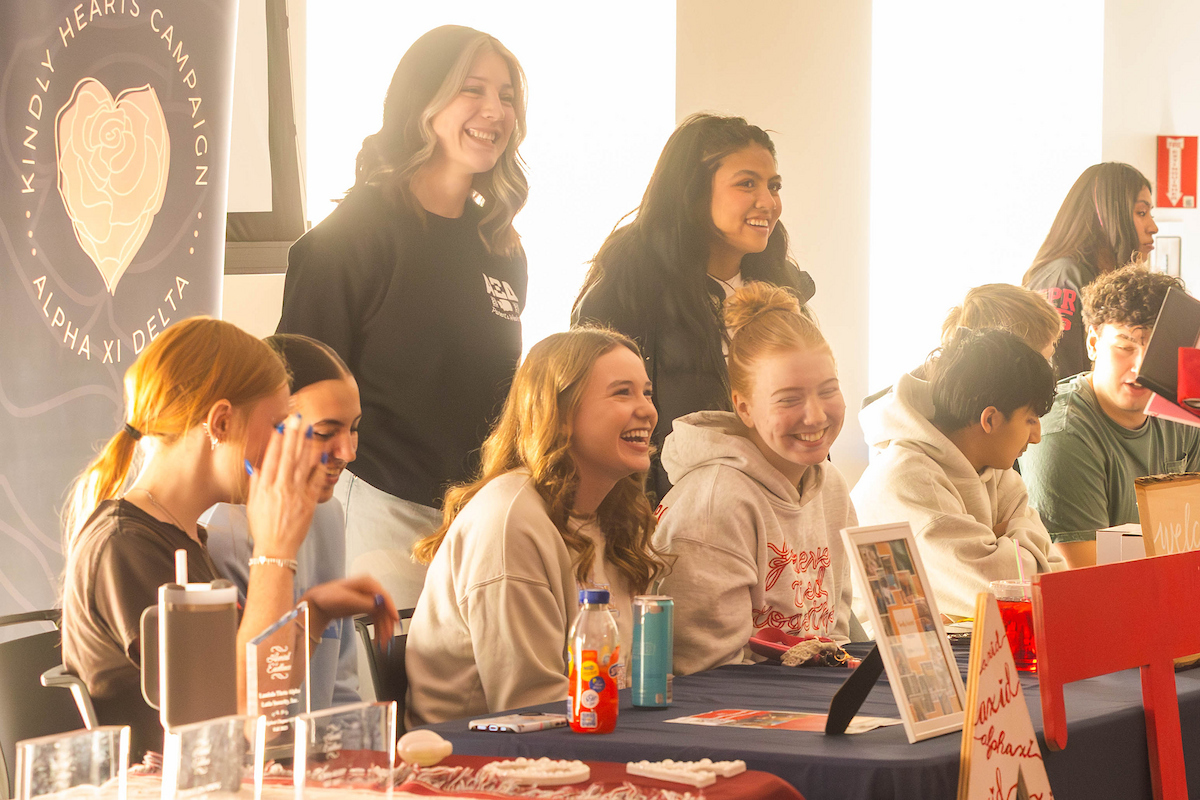 Sorority members laughing.