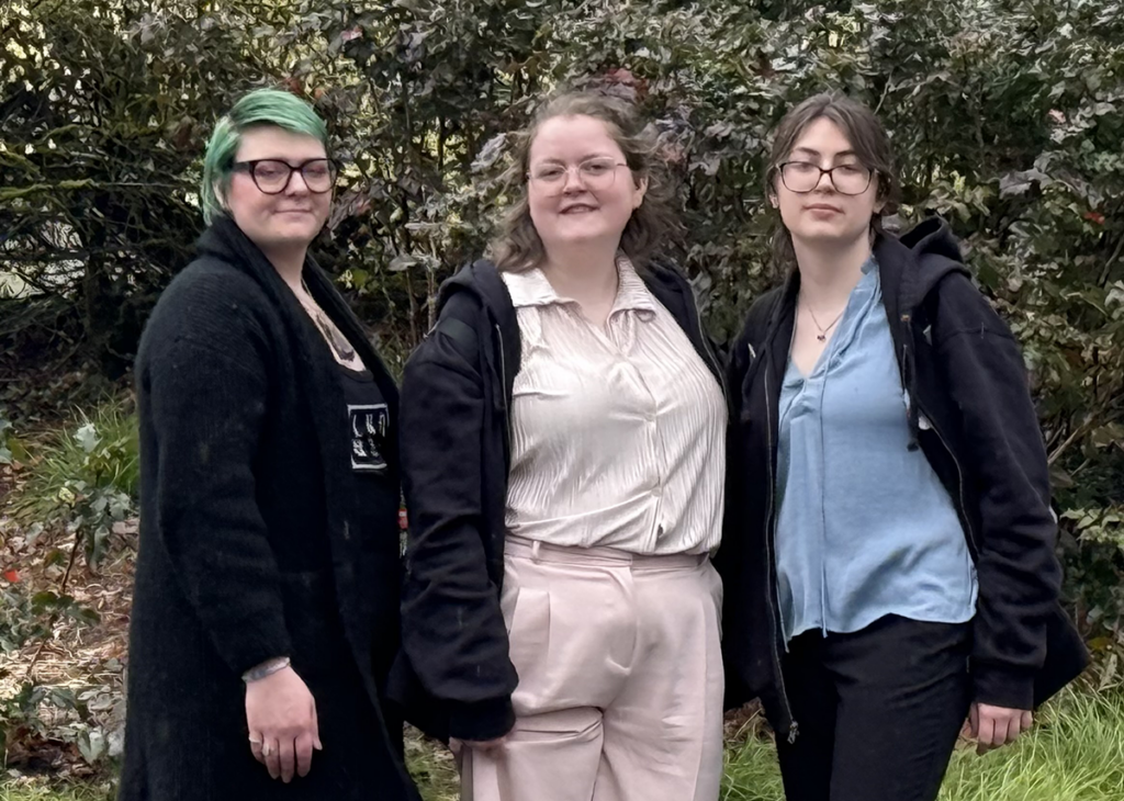 Three GWSS students pictured outdoors.