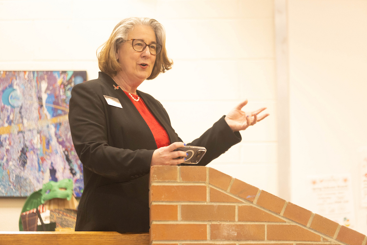 Michelle DenBeste, CAHSS dean, speaking.