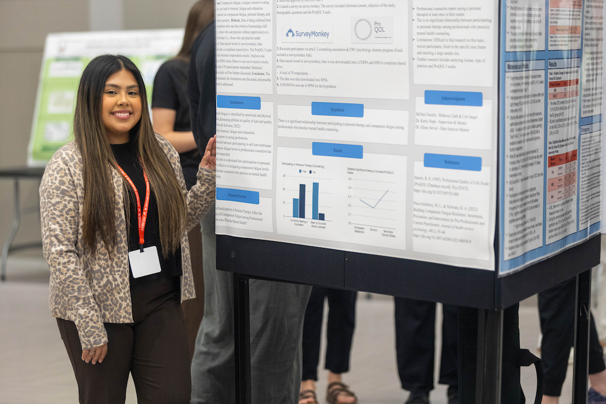 Student with poster presentation