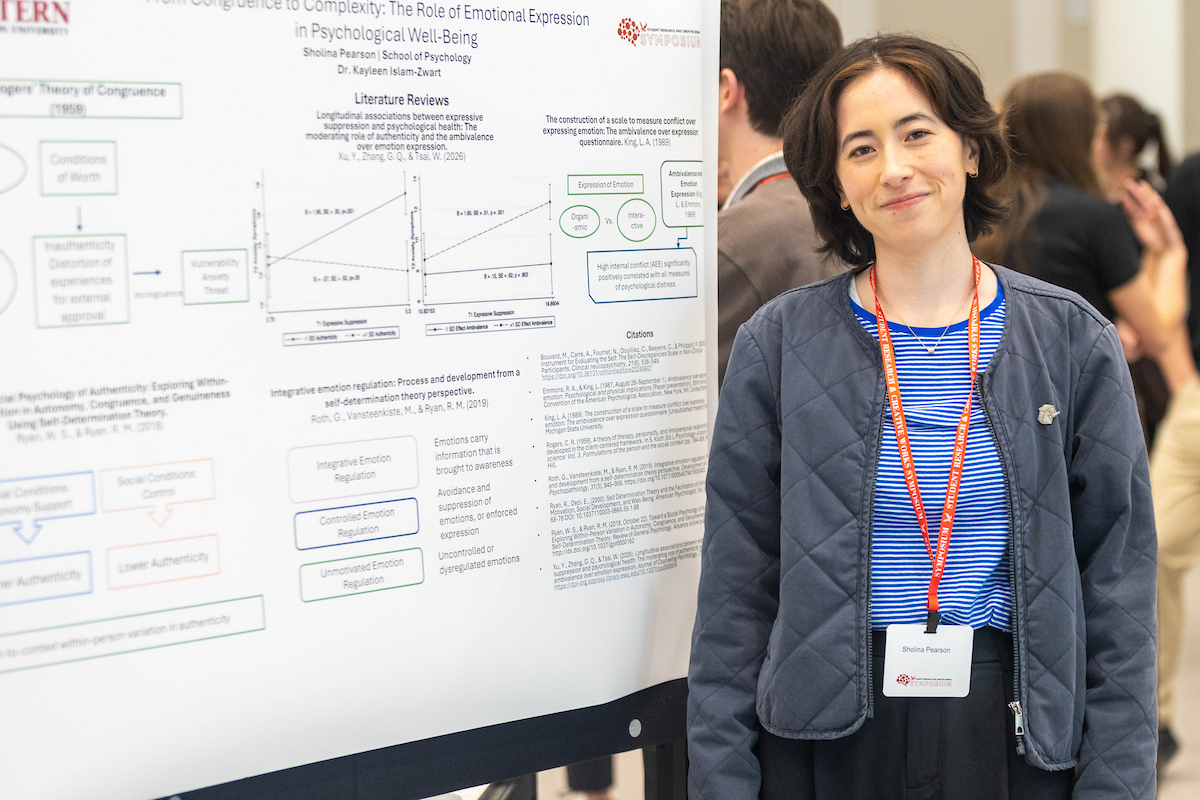 student with poster presentation