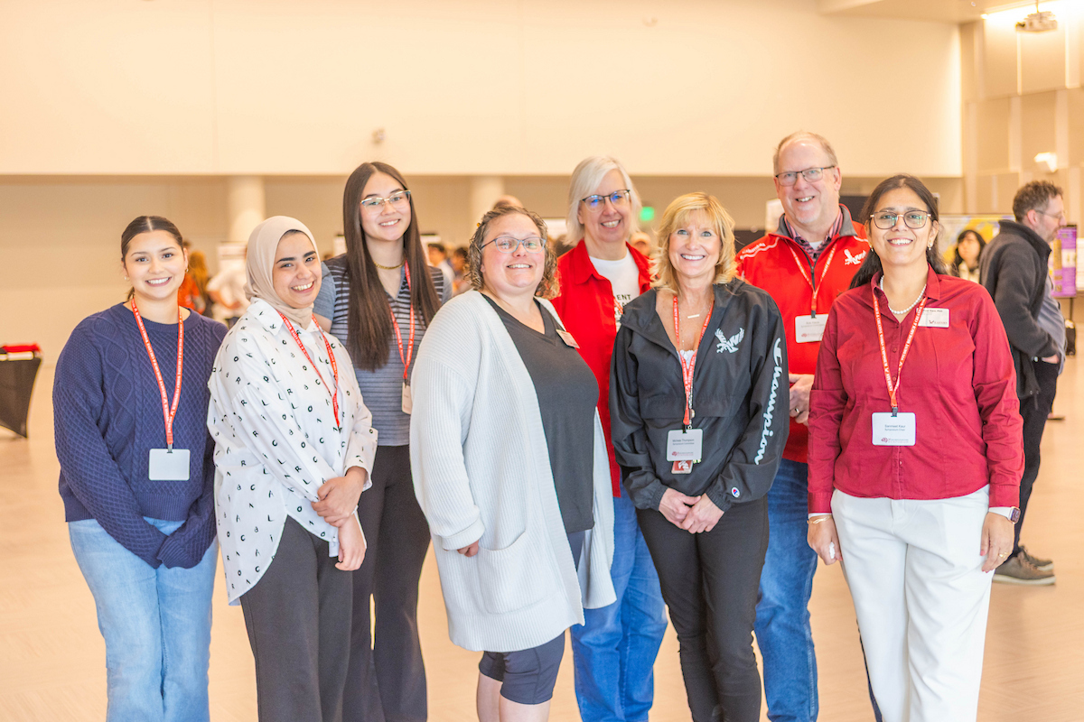 Eight faculty, staff and students.