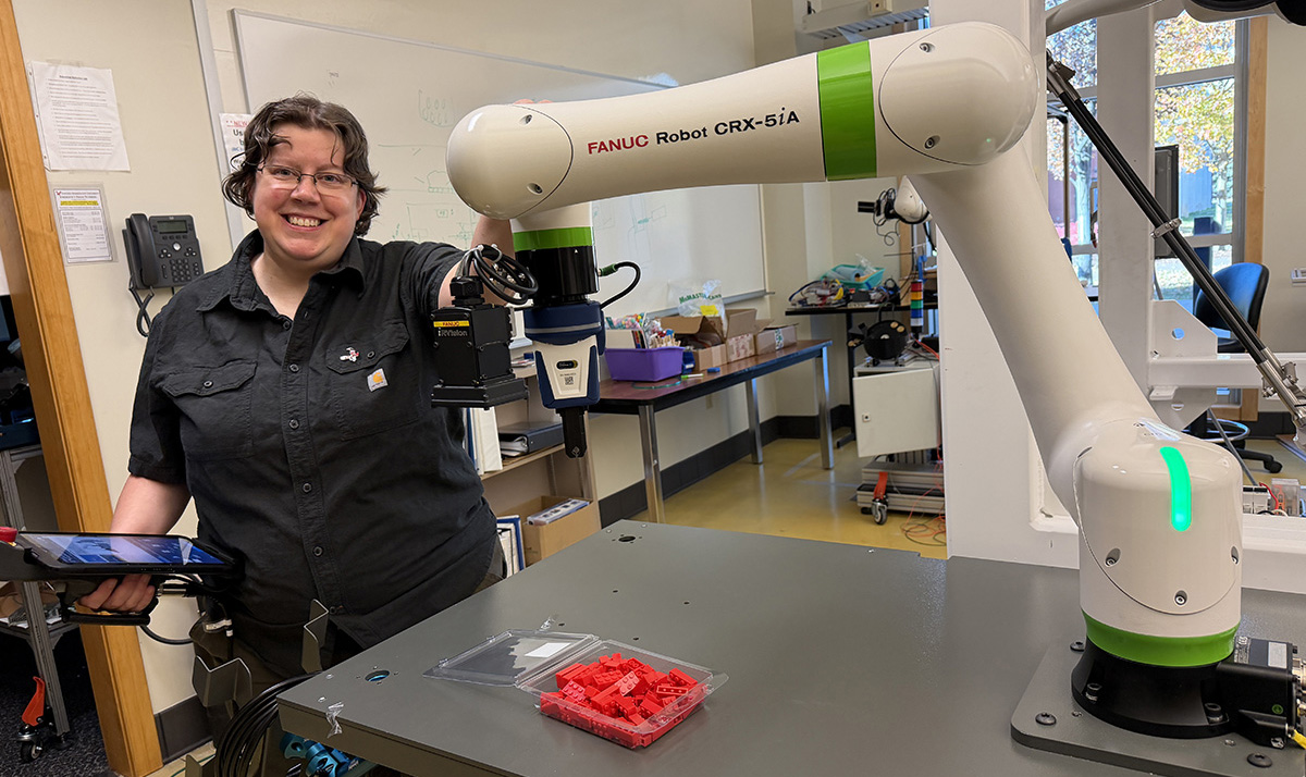 Jennifer Leaf with Eastern's newest robot.