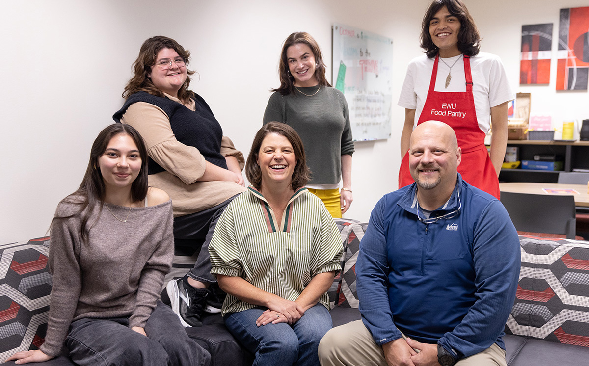 photo of the Wellness and Counseling Services team of four with two student employees.